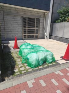 Japonya çöp toplama yeşil file çanta sokak